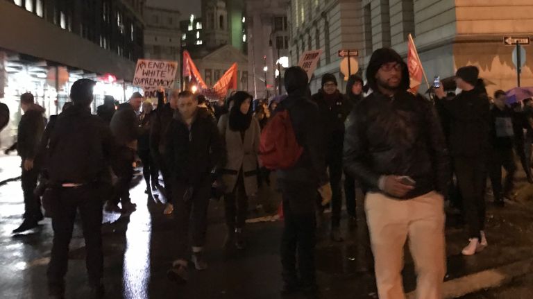 Protesters gathered in Foley Square before marching through downtown Manhattan on Friday, Jan. 20, 2017, to protest President Donald Trump on Inauguration Day.