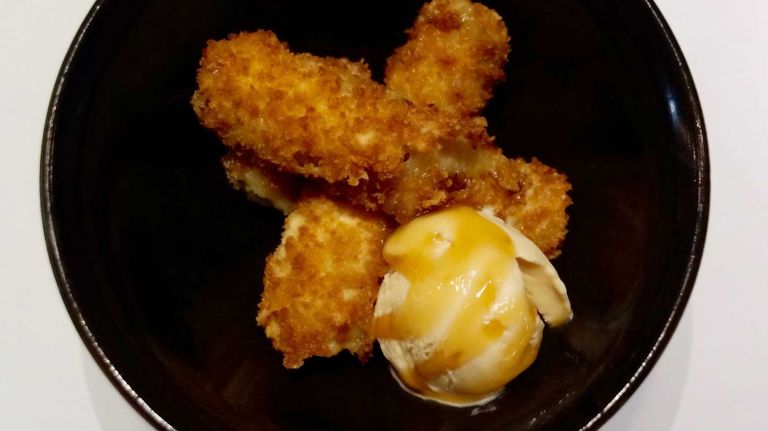 This dish is a reason to save room for dessert: deep fried bananas paired with a scoop of salted caramel ice cream.