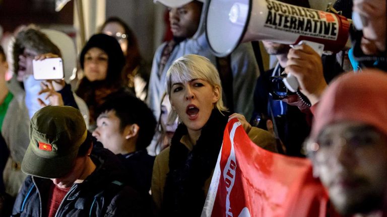Anti-Trump protesters chant in Union Square before marching uptown to Trump Tower on Wednesday, Nov. 9, 2016.