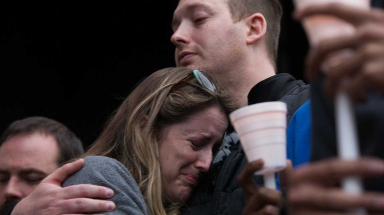 Bronx police shooting: Photos from the scene and more 22 A vigil was held for slain NYPD Sgt. Paul Tuozzolo outside The Paramount in Huntington on Nov. 5, 2016.