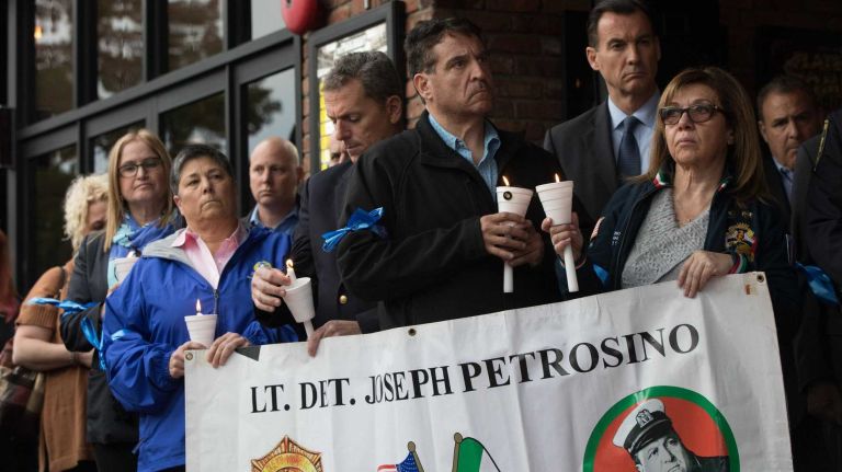 Bronx police shooting: Photos from the scene and more 23 Local legislators attend a vigil for slain NYPD Sgt. Paul Tuozzolo outside The Paramount in Huntington on Nov. 5, 2016.