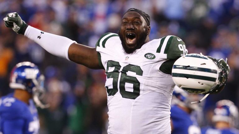 Muhammad Wilkerson #96 of the New York Jets celebrates after defeating the New York Giants in overtime at MetLife Stadium on Dec. 6, 2015 in East Rutherford, N.J.