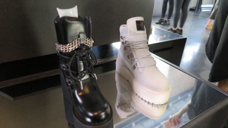 Rihanna's NYC pop-up debuts latest Puma collaboration ahead of NYFW 12 These edgy black wedge boots with chain detailing and grey platform kicks seem like more comfortable options.