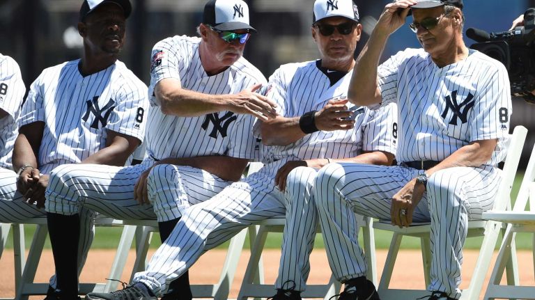 Former New York Yankees players Rickey Henderson, Rich 