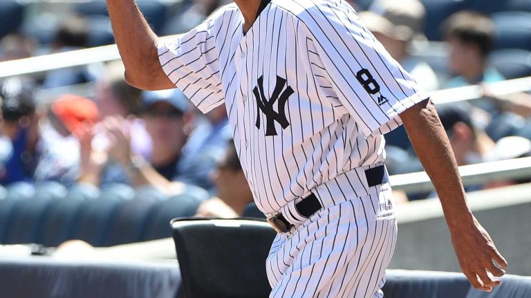 Former New York Yankees player Oscar Gamble waves to fans during the 70th annual Old-Timers' Day at Yankee Stadium on Sunday, June 12, 2016.