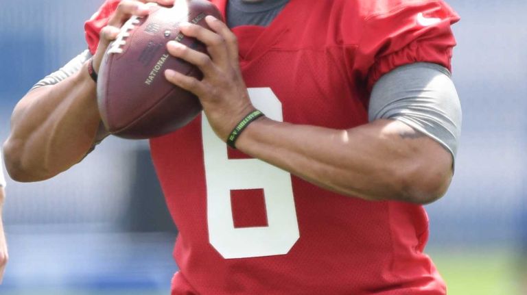 New York Giants quarterback B.J. Daniels looks to pass the football during the Giants Organized Team Activities at Quest Diagnostics Training Center on Wednesday, June 1, 2016.