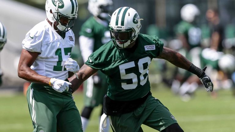 Erin Henderson (#58) of the Jets works against Charone Peake (#17) during the Jets' OTAs on Wednesday, June 1, 2016 in Florham Park, N.J.
