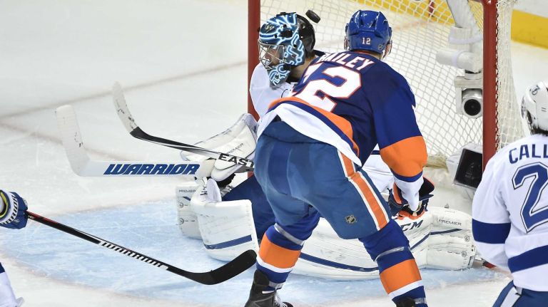 New York Islanders left wing Josh Bailey (12) scores on Tampa Bay Lightning goalie Ben Bishop (30) in the third period in Game 3 of the Eastern Conference semifinals on Tuesday, May 3, 2016 at Barclays Center.