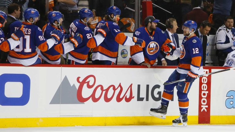 New York Islanders left wing Josh Bailey (12) celebrates his goal with the bench in the first period of Game 3 of the Eastern Conference semifinals against the Tampa Bay Lightning on Tuesday, May 3, 2016 at Barclays Center.