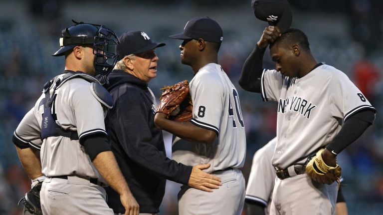 Yankees vs. Orioles 12 Starting pitcher Luis Severino #40 of the New York Yankees is talked to in the second inning against the Baltimore Orioles at Oriole Park at Camden Yards on May 3, 2016 in Baltimore.