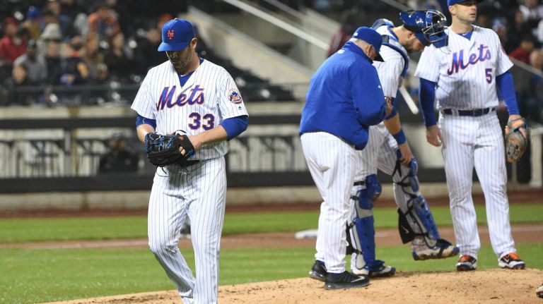 Mets vs. Braves 19 New York Mets starting pitcher Matt Harvey walks to the dugout after being taken out during the sixth inning against the Atlanta Braves in an MLB baseball game at Citi Field on Tuesday, May 3, 2016.