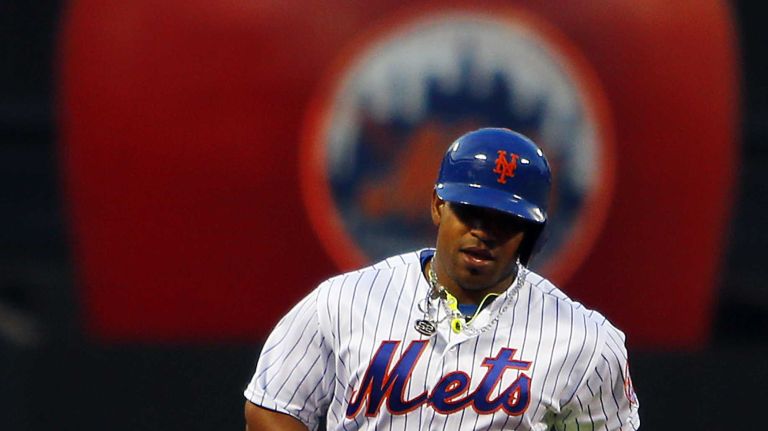 Mets vs. Braves 33 Yoenis Cespedes #52 of the New York Mets runs the bases after his two-run home run in the first inning of a game against the Atlanta Braves at Citi Field on Monday, May 2, 2016.