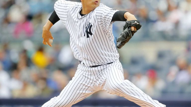 Yankees vs. Rays 112 Masahiro Tanaka #19 of the New York Yankees pitches in the first inning against the Tampa Bay Rays at Yankee Stadium on Saturday, April 23, 2016 in the Bronx Borough of New York City.
