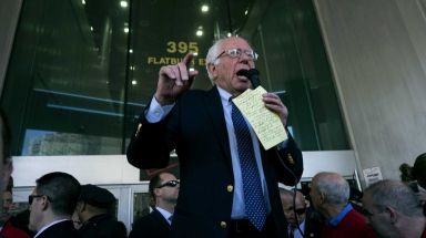 Bernie Sanders joins a picket line of Verizon workers who were striking outside the company