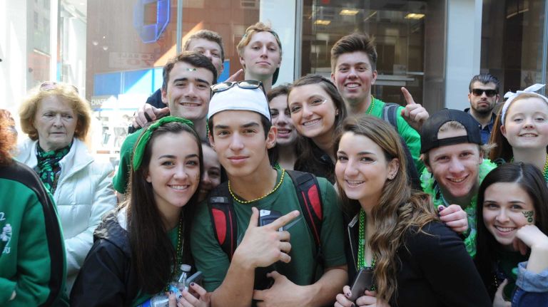 Spectators are in a lighthearted mood for the St. Patrick's Day Parade in Manhattan on Thursday, March 17, 2016.