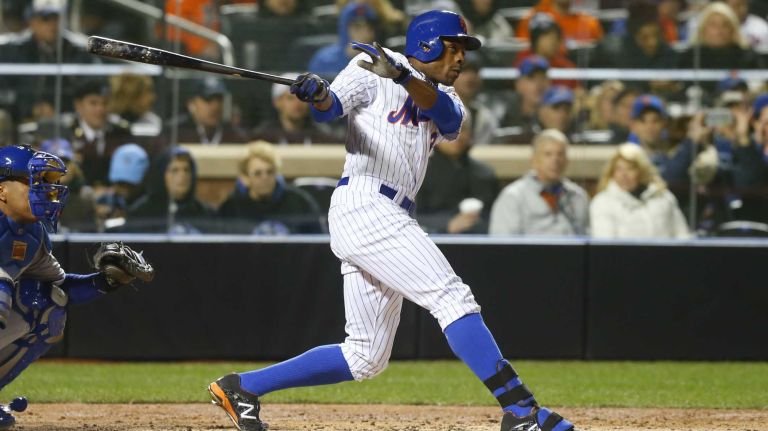 New York Mets right fielder Curtis Granderson (3) smacks a two-run homer in the third inning during Game 3 of the World Series against the Kansas City Royals at Citi Field on Friday, Oct. 30, 2015.