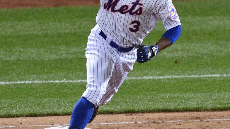 New York Mets rightfielder Curtis Granderson reacts as he rounds the bases on his two-run home run during Game 3 of the World Series against the Kansas City Royals at Citi Field on Friday, Oct. 30, 2015.
