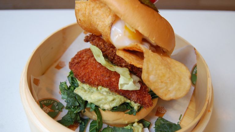 Uncle Sam's in NYC debuts fried chicken sandwich topped with Sriracha potato chips, poached egg 9 The poached egg that tops this