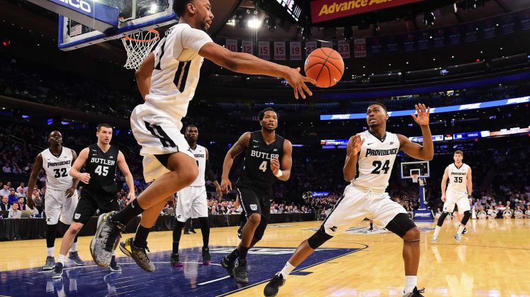 Providence guard Jalen Lindsey (21) attempts to save the ball by passing to teammate guard Kyron Cartwright (24) as Butler forward Tyler Wideman (4) defends during the Big East Tournament at Madison Square Garden in New York, New York on Thursday, Mar 10, 2016. Big East Basketball Tournament between #5 Butler and #4 Providence.