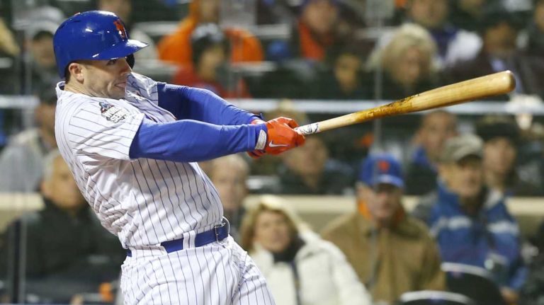 New York Mets third baseman David Wright (5) smacks a first-inning home run during Game 3 of the World Series against the Kansas City Royals at Citi Field on Friday, Oct. 30, 2015.