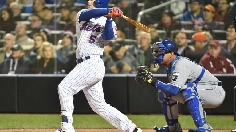 New York Mets third baseman David Wright (5) smacks a homerun in first inning during Game 3 of the World Series against the Kansas City Royals at Citi Field on Friday, Oct. 30, 2015.