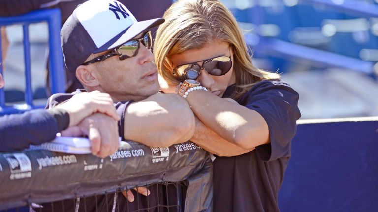 New York Yankees spring training 2016 108 New York Yankees' Joe Girardi watches batting practice with his daughter Serena during spring training at George M. Steinbrenner Field in Tampa, Fla. on Feb. 28, 2016.