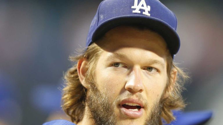 Los Angeles Dodgers starting pitcher Clayton Kershaw looks on during warmups ahead of Game 3 of the NLDS against the New York Mets on Monday, Oct. 12, 2015.