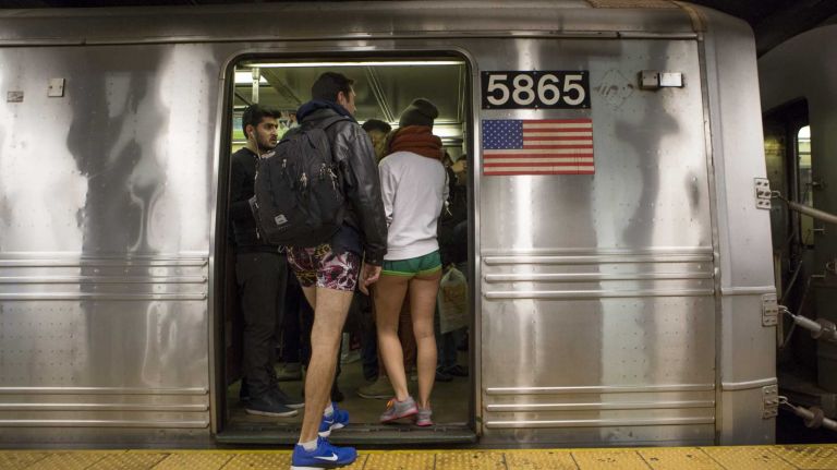 Participants in the No Pants Subway Ride take a train in their underwear in New York on Jan. 10, 2016.