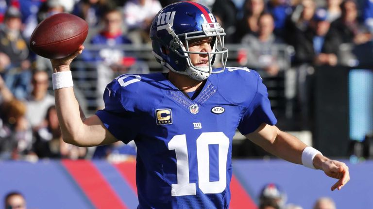 Eli Manning #10 of the New York Giants looks to throw the ball against the New York Jets at MetLife Stadium on Sunday, Dec. 6, 2015 in East Rutherford, N.J.