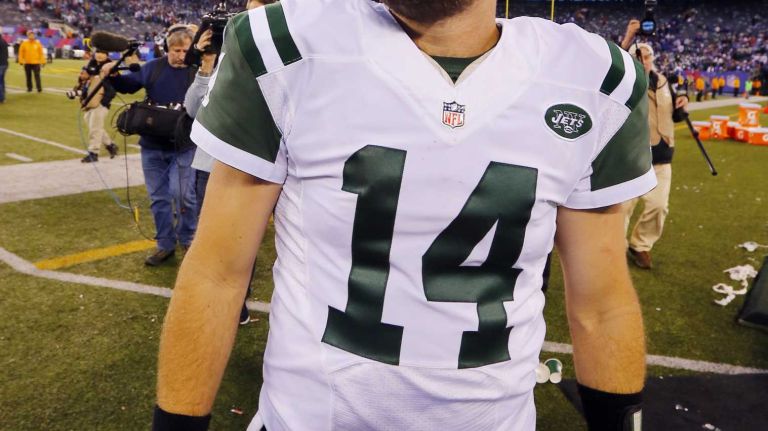 Ryan Fitzpatrick #14 of the New York Jets walks off the field after defeating the New York Giants at MetLife Stadium on Sunday, Dec. 6, 2015 in East Rutherford, N.J.