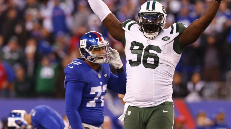 Muhammad Wilkerson #96 of the New York Jets celebrates after defeating the New York Giants in overtime at MetLife Stadium on Dec. 6, 2015 in East Rutherford, N.J.