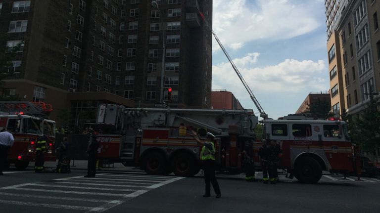 Firefighters trying to bring a two-alarm blaze under control in a Hell's Kitchen apartment on June 1, 2016, had to fight hoarder conditions to even get in the door, authorities said. 