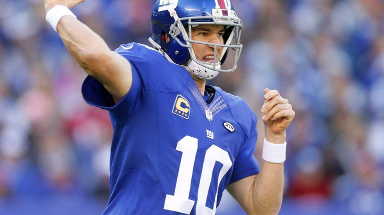 Eli Manning #10 of the New York Giants throws a pass in the first half against the New York Jets at MetLife Stadium on Dec. 6, 2015 in East Rutherford, N.J.