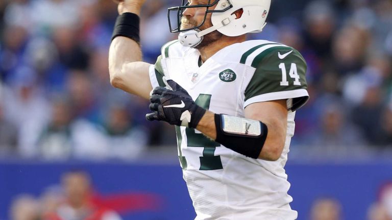 Ryan Fitzpatrick #14 of the New York Jets thows a pass in the first half against the New York Giants at MetLife Stadium on Dec. 6, 2015 in East Rutherford, N.J.