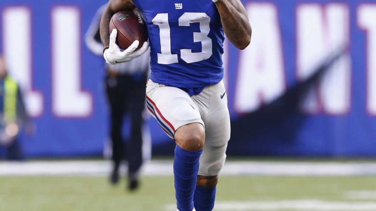 Odell Beckham #13 of the New York Giants runs with the ball after the catch for a touchdown against the New York Jets at MetLife Stadium on Dec. 6, 2015 in East Rutherford, N.J.