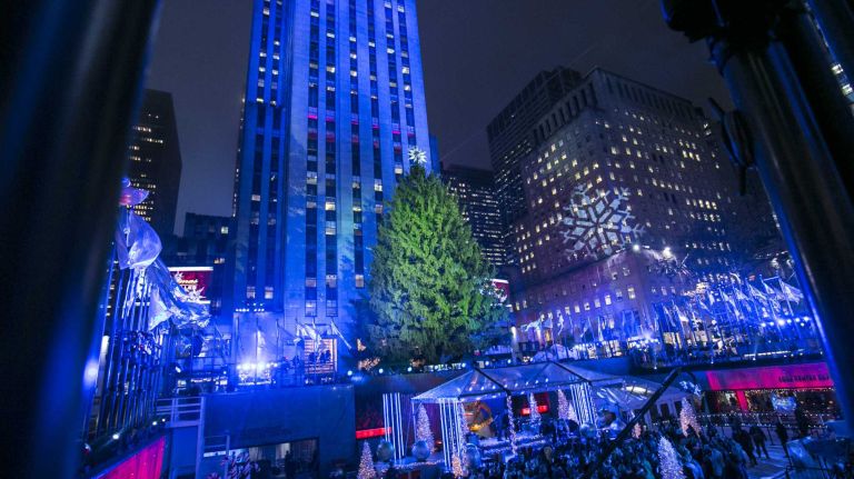 Blue lights illuminate the plaza before the ceremony at Rockefeller Center in Manhattan on Dec. 2, 2015.