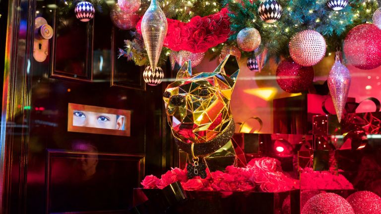 Heighten your senses with the windows at Bloomingdale's 11 Dog made of gold and flowers galore, what a feast for the eyes in this window decor!