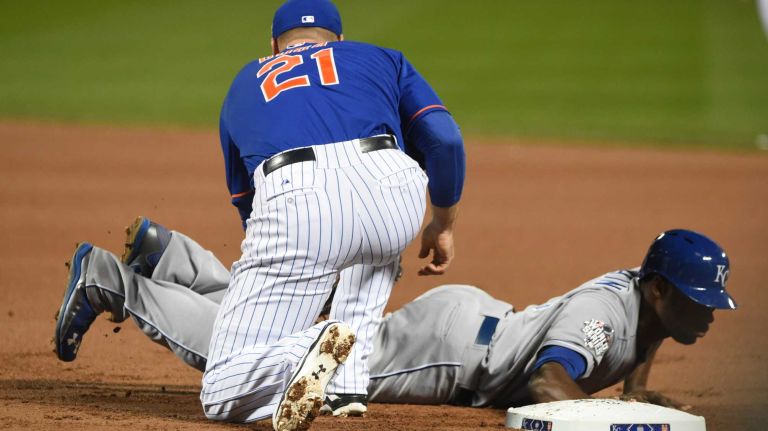 World Series Game 5: Mets vs. Royals 163 New York Mets first baseman Lucas Duda (21) is late with the tag as Kansas City Royals centerfielder Lorenzo Cain (6) gets back to first base in the first inning during Game 5 of the World Series at Citi Field on Sunday, Nov. 1, 2015.