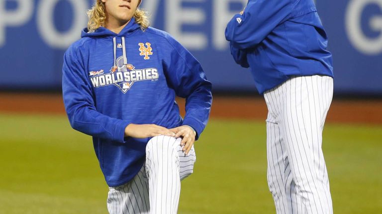 World Series Game 5: Mets vs. Royals 195 New York Mets manager Terry Collins (10) talks with New York Mets starting pitcher Noah Syndergaard (34) during warmups before Game 5 of the World Series against the Kansas City Royals at Citi Field on Sunday, Nov. 1, 2015.