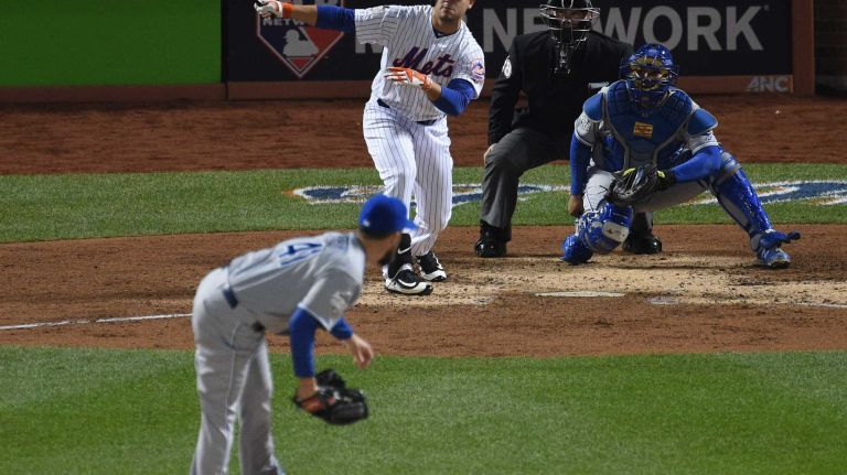 New York Mets left fielder Michael Conforto hits his second solo home run during Game 4 of the World Series against the Kansas City Royals at Citi Field on Saturday, Oct. 31, 2015.