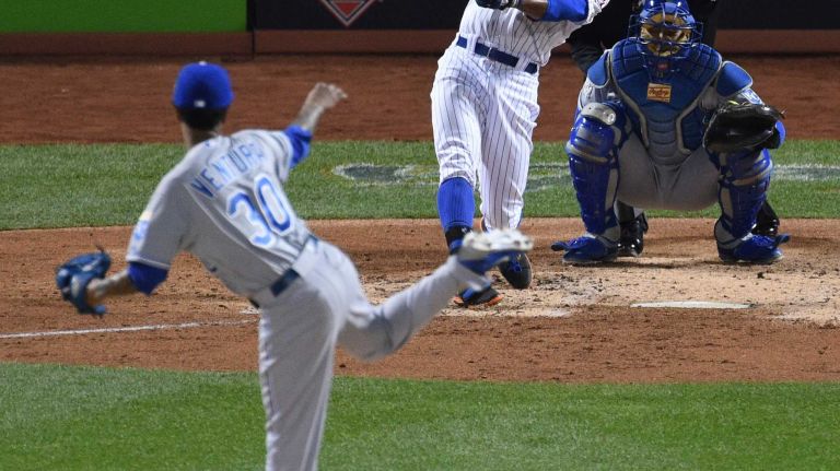 New York Mets rightfielder Curtis Granderson hits a two-run home run against starting pitcher Yordano Ventura during Game 3 of the World Series against the Kansas City Royals at Citi Field on Friday, Oct. 30, 2015.