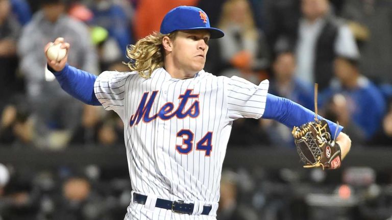 New York Mets starting pitcher Noah Syndergaard delivers the pitch in the first inning during Game 3 of the World Series against the Kansas City Royals at Citi Field on Friday, Oct. 30, 2015.