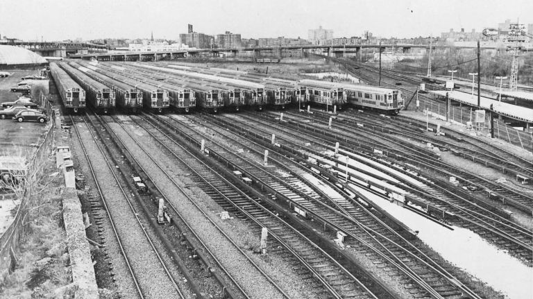 Idle trains sitting in the transit yard on Roosevelt Avenue near Shea Stadium in Flushing, Queens. (April 1, 1980)