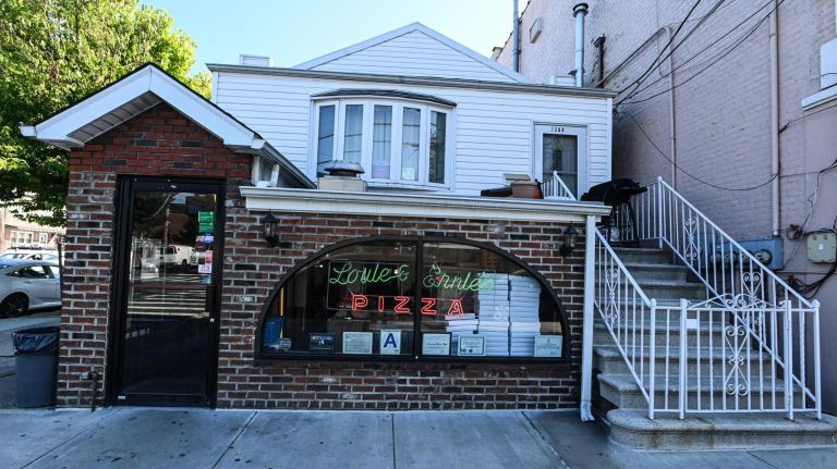 Brothers behind Louie and Ernie's keep it simple: 'We just make pizza' 3 Louie and Ernie's Pizza is located at 1300 Crosby Ave. in the Bronx.