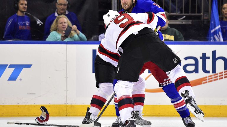 Rangers fights in 2015-16 NHL season 22 New York Rangers left wing Tanner Glass (15) and New Jersey Devils center Jiri Tlustsy (9) fight in the second period at Madison Square Garden on Monday, Sept. 21, 2015.