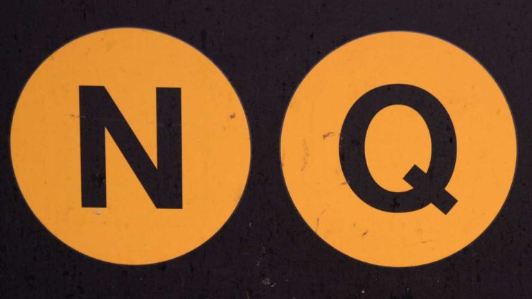 An MTA conductor was punched in the face on the N train in midtown after telling a man that the Q train does not go to Astoria, Queens, police said.