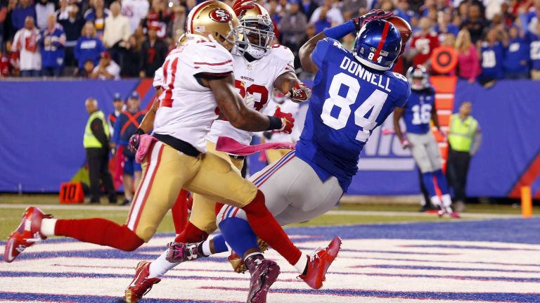 Larry Donnell #84 of the New York Giants hauls in the game-winning touchdown late in the fourth quarter against the San Francisco 49ers at MetLife Stadium on Sunday, Oct. 11, 2015 in East Rutherford, N.J.