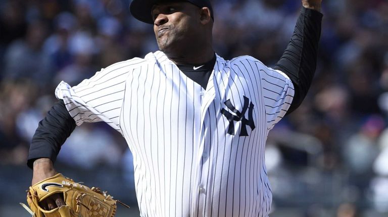 New York Yankees starting pitcher CC Sabathia delivers against the New York Mets during the second inning of a baseball game at Yankee Stadium on Saturday, April 25, 2015.