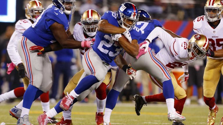 Rashad Jennings #23 of the New York Giants runs the ball against the San Francisco 49ers at MetLife Stadium on Sunday, Oct. 11, 2015 in East Rutherford, N.J.