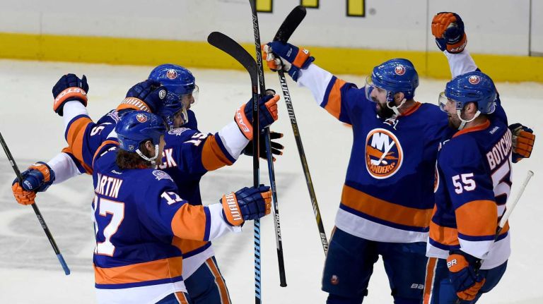 Eastern Conference quarterfinals Game 6: Islanders vs. Capitals 62 New York Islanders' John Tavares, Matt Martin, Cal Clutterbuck, Nick Leddy and Johnny Boychuk celebrate Clutterbuck's goal in the third period against the Washington Capitals during Game 6 of the Eastern Conference quarterfinals at Nassau Coliseum on Saturday, April 25, 2015.